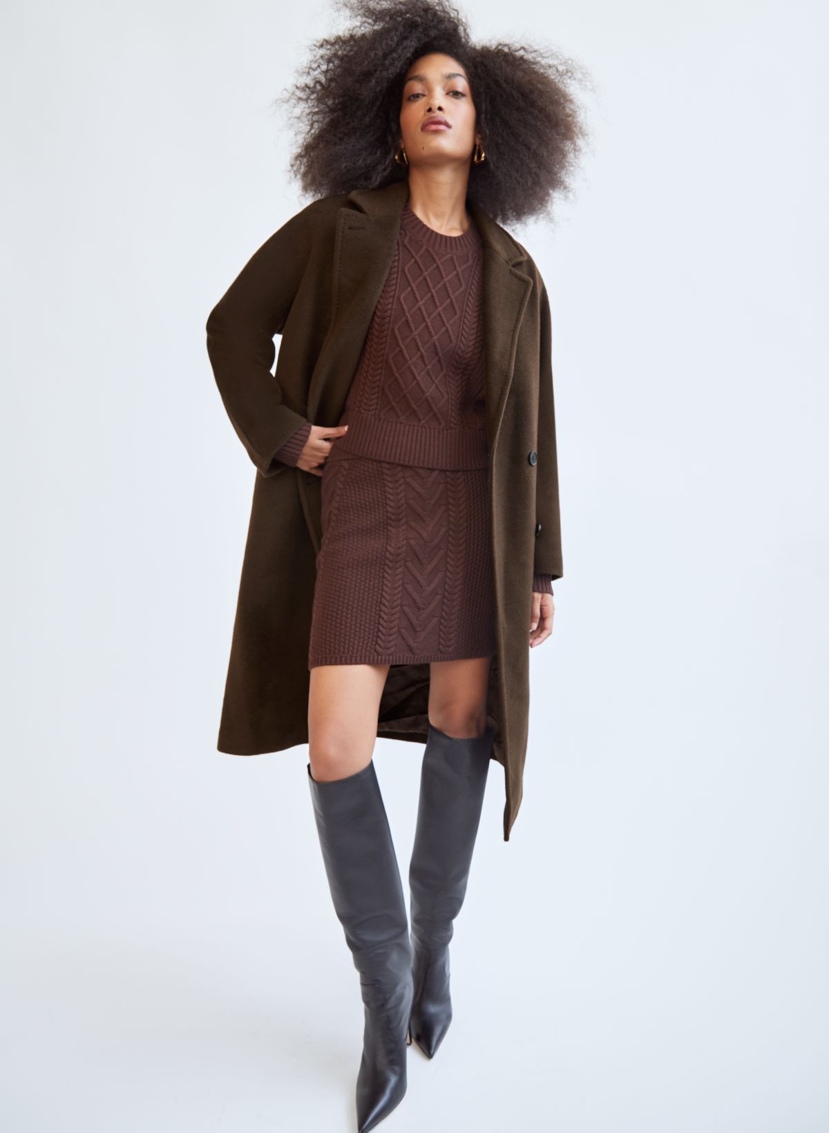 Woman in a Wool Winter Coat and Leather Knee High Boots · Free Stock Photo