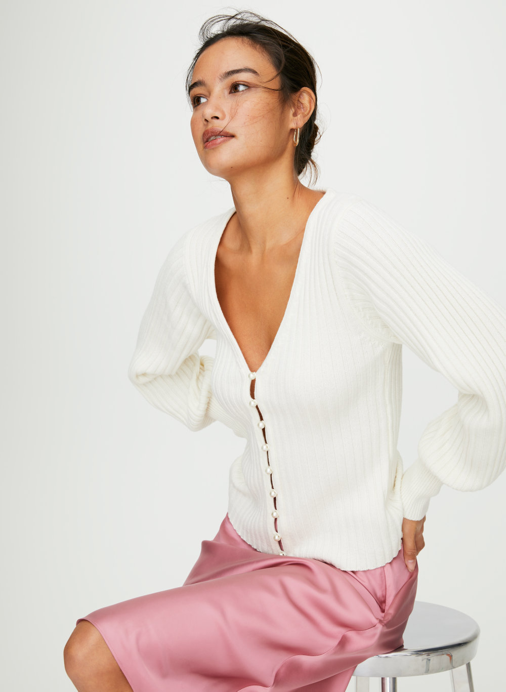 white sweater with pearls