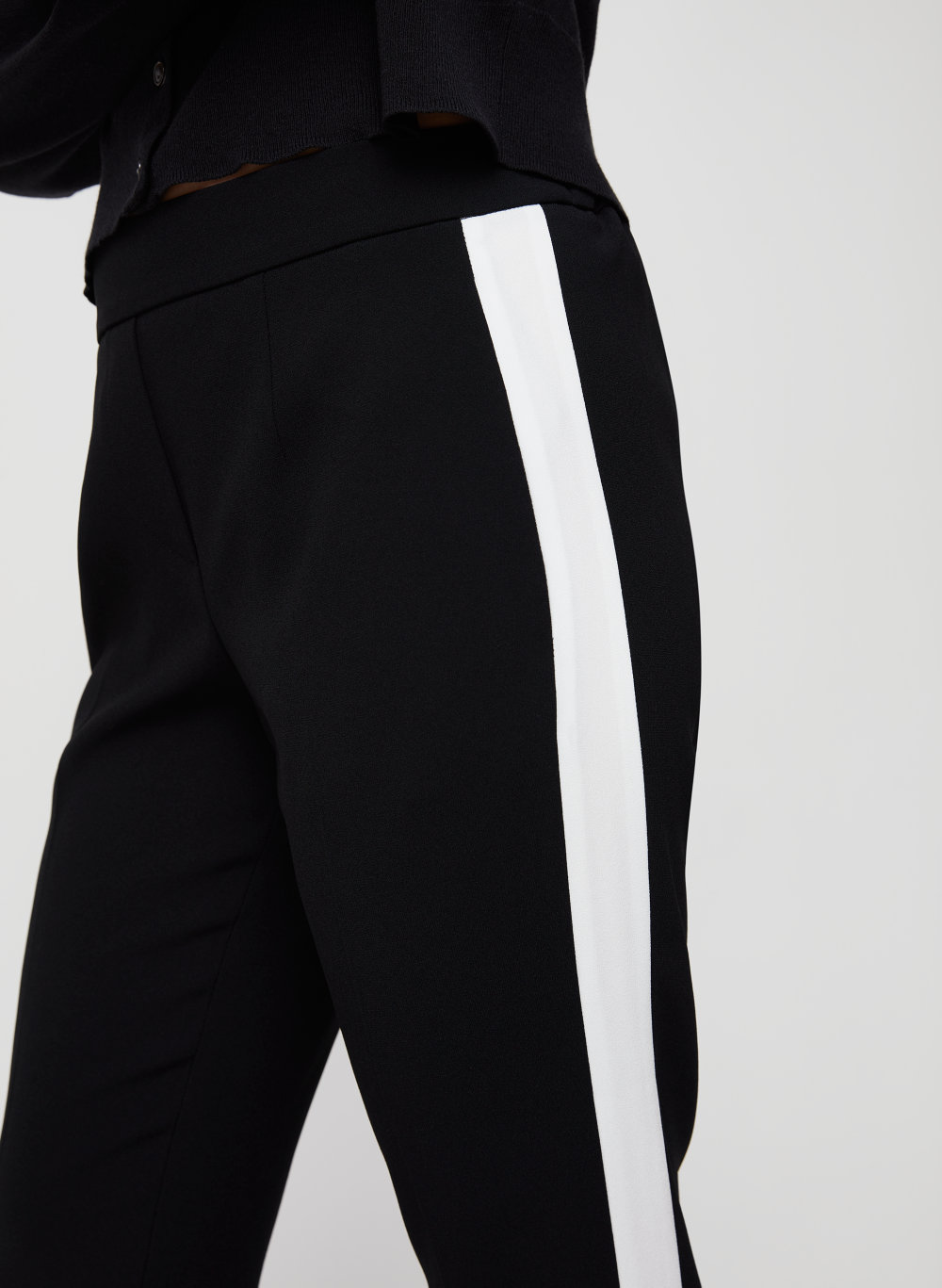 black pants with white stripe on side