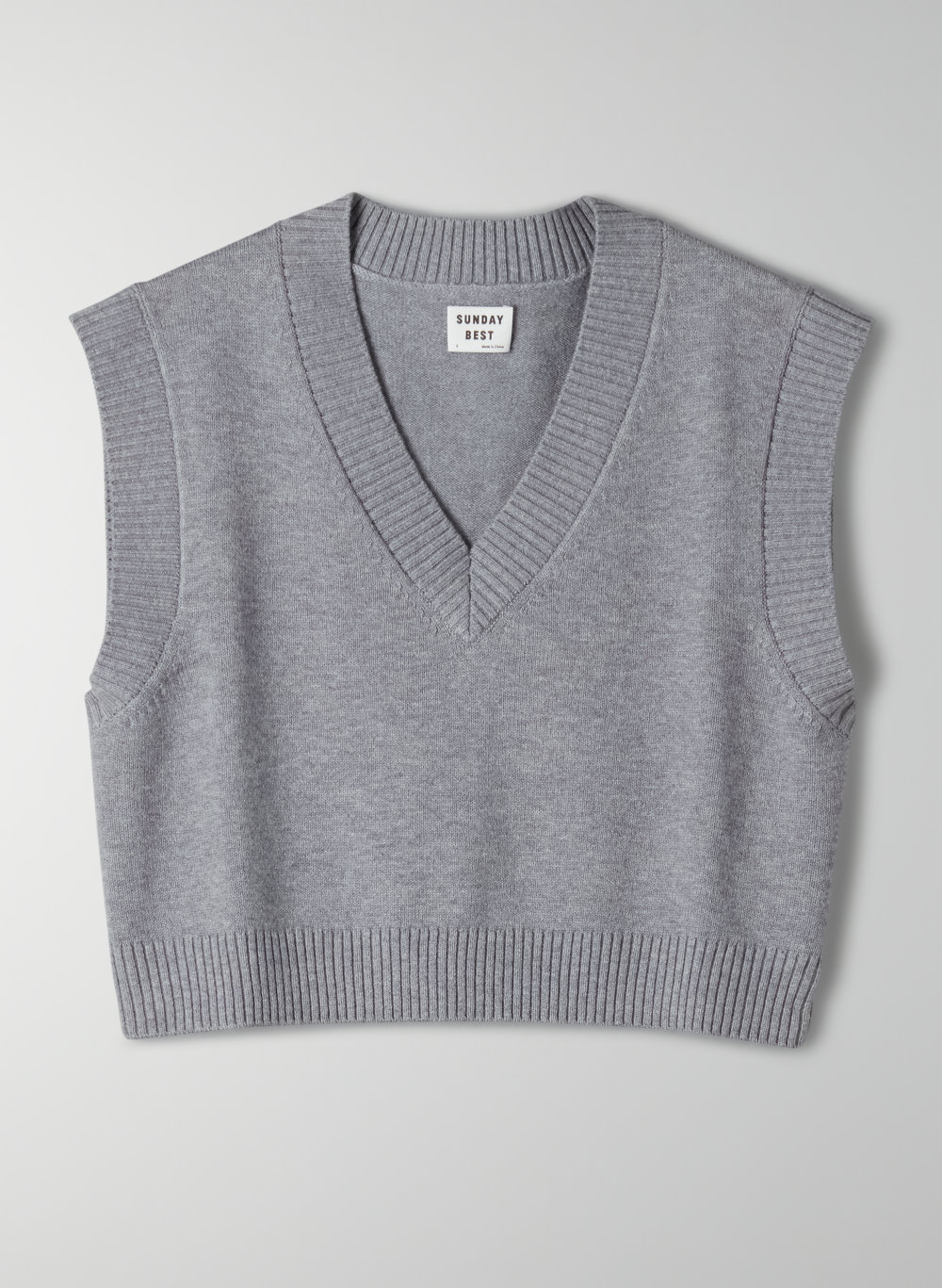 black cropped sweater vest