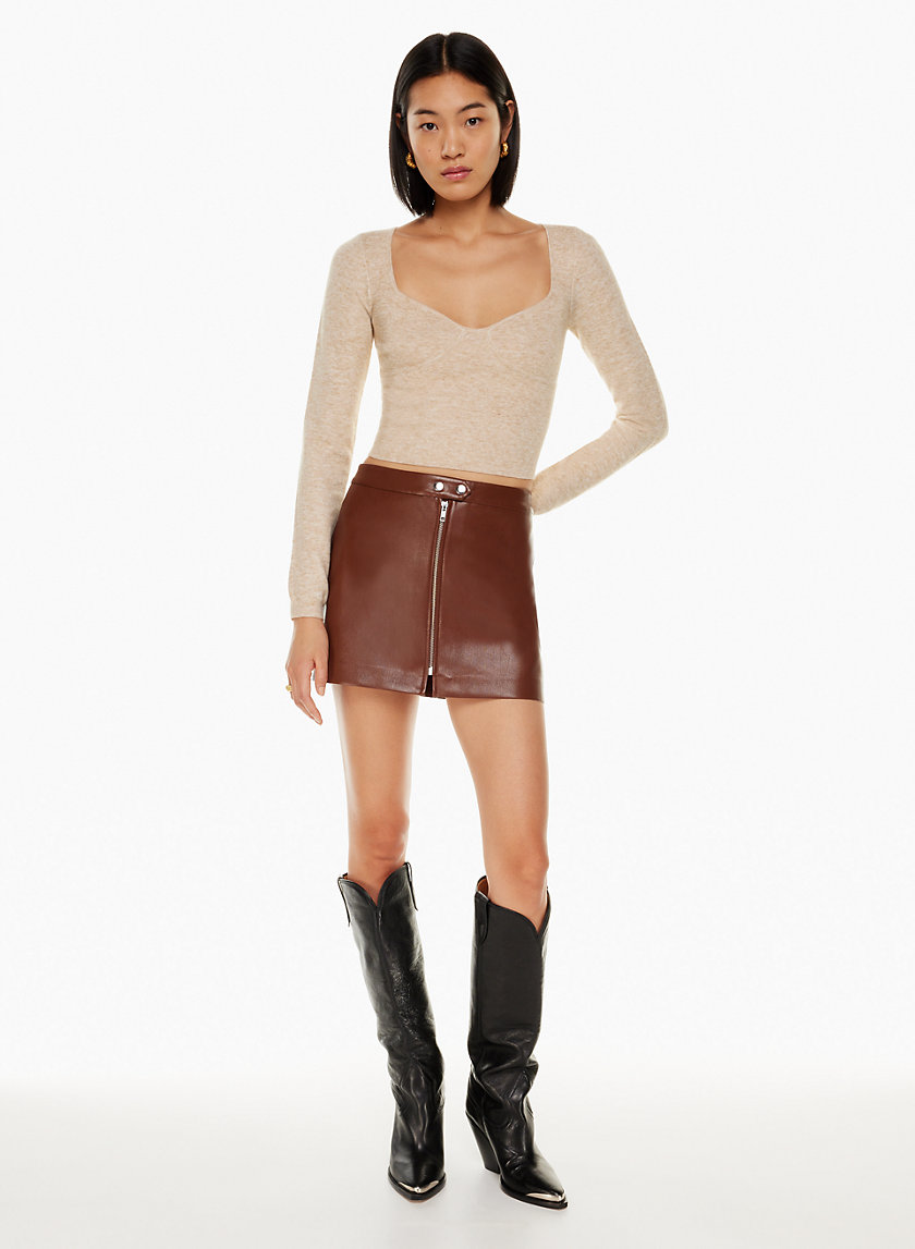 I'm midsize and a size 12 - I found the coziest Aerie sweater to touch my  body, a faux leather skirt was 'everything