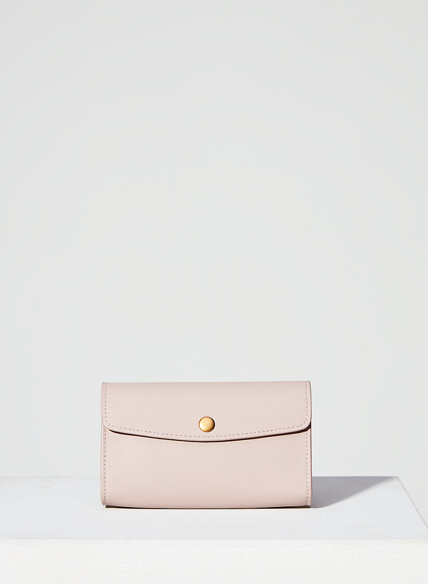 Kate textured-leather belt bag