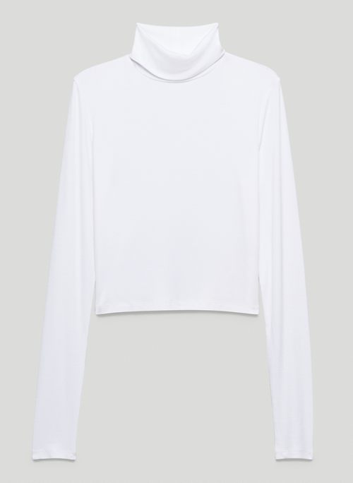 black turtleneck white shirt