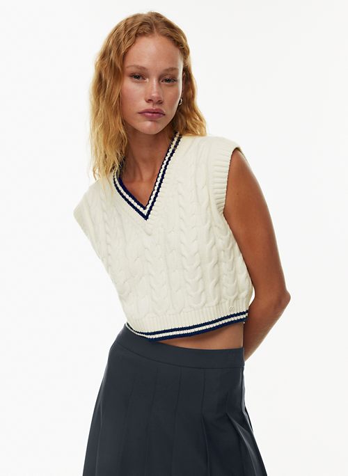 NUFIWI Women Knitted Turtleneck Sweater Vest Sleeveless Knitted Crop Tank  Top Casual Loose Warm Pullover Sweater, A White, Small : :  Clothing, Shoes & Accessories