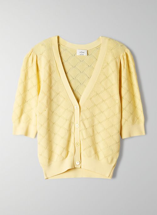 yellow cardigan