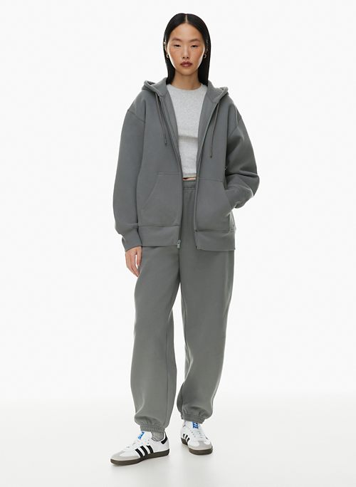 Grey sweatsuit. Hoodie with logo in the middle and matching sweatpants