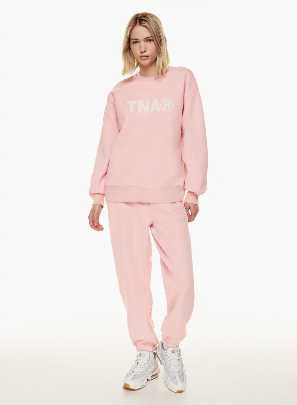 Finally got a matching sweatsuit set (TNA cozy fleece boyfriend) GD oracle  pink in both regular and small. I'm 53, 112 pounds, and it's cute, fits  well and is roomy! The color