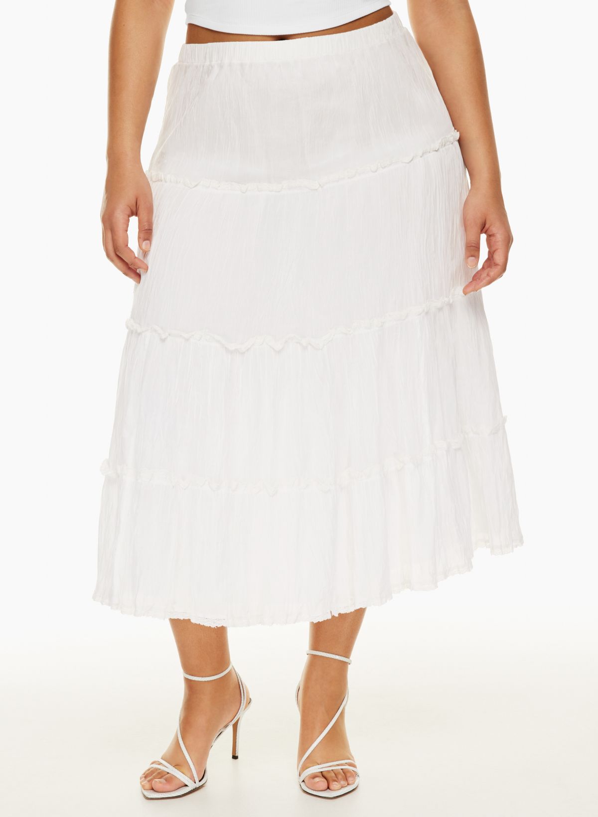 White ruffle skirt shop 7 little words