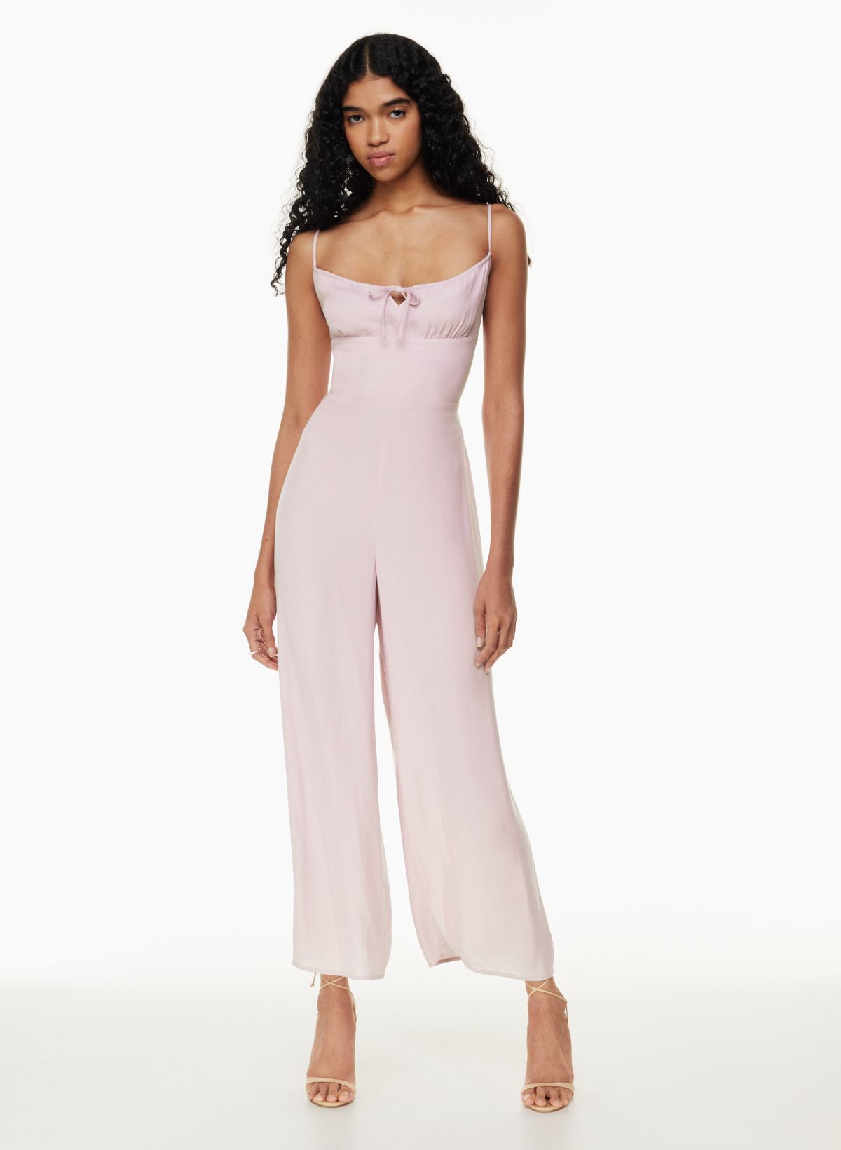 Divinity jumpsuit aritzia  Body suit outfits, Aritzia outfit, Flare outfit