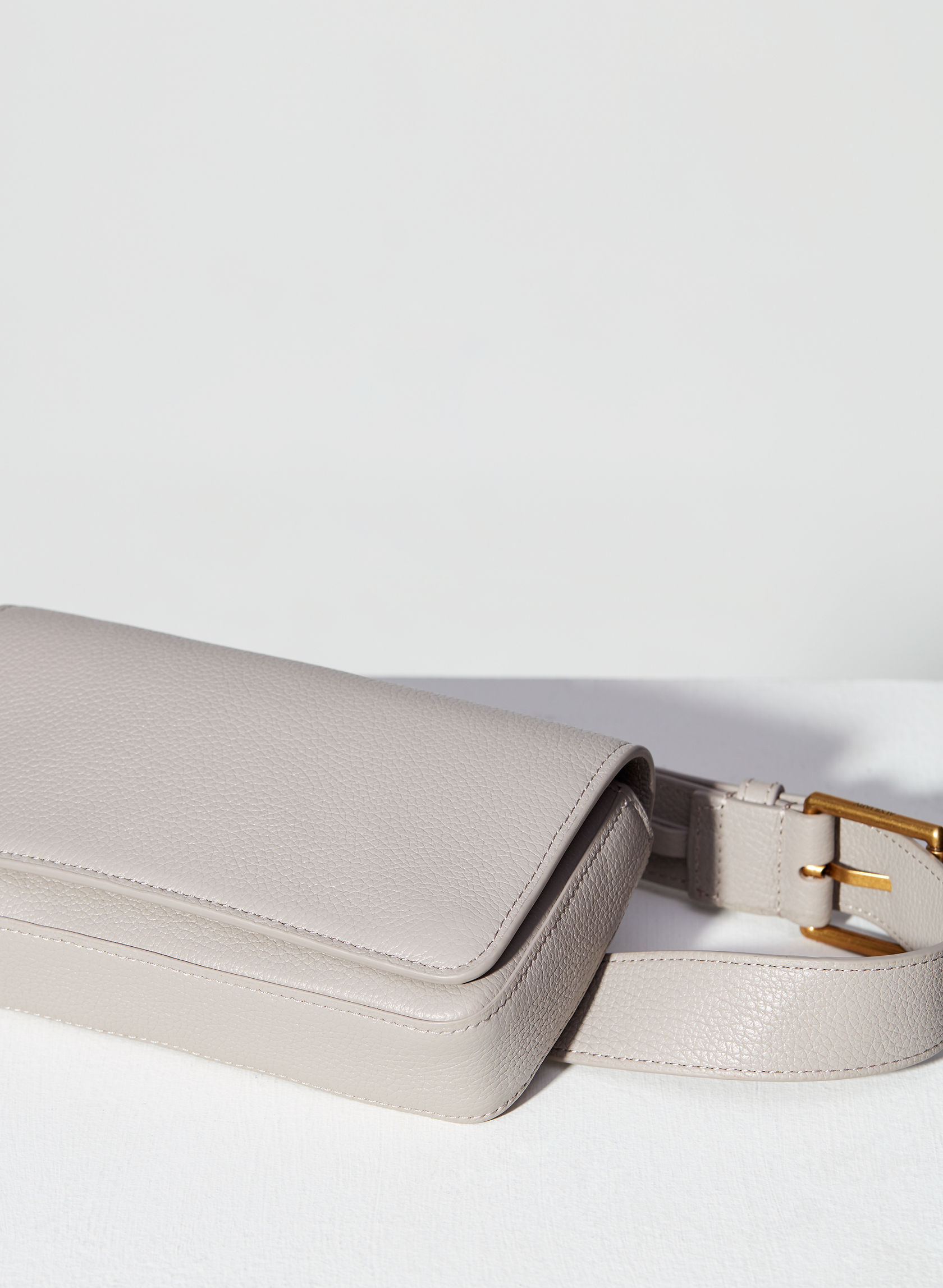 Auxiliary LEATHER FLAP BELT BAG Aritzia US